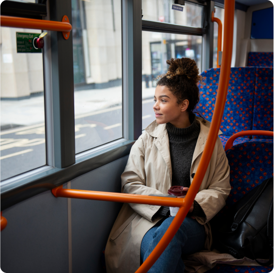 young-woman-riding-bus-city